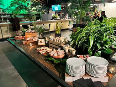 display table of appetizer stations for a social event