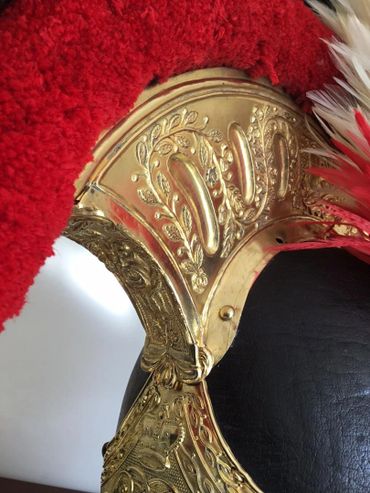 Detailed inscribed crest of the helmet