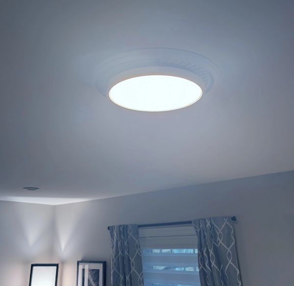 Low profile ceiling fixture set to white