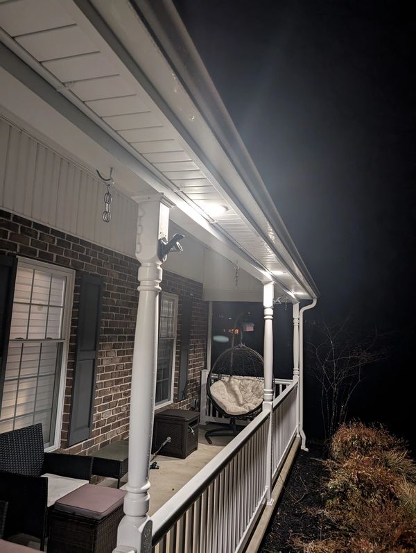 Exterior lights turn on at sunset and off at bedtime, set to cool white temperature