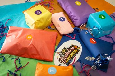 Personalized birthday countdown packages filled with fun gifts and surprises.
