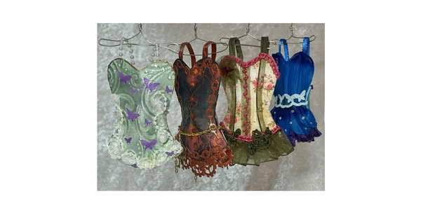 Elegant handmade paper corsets in miniature form—perfect for collectors who love whimsical, gothic, Victorian, or steampunk-inspired display art.