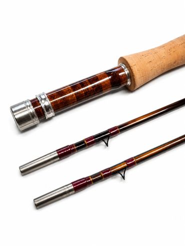 Close-up of a disassembled fishing rod with wooden and metal details.