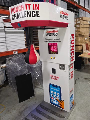 Custom Branded Punching Bag Boxer Arcade Game Rental (for AutoZone) by Castle Party Planning