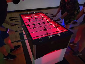 Rent glow foosball table