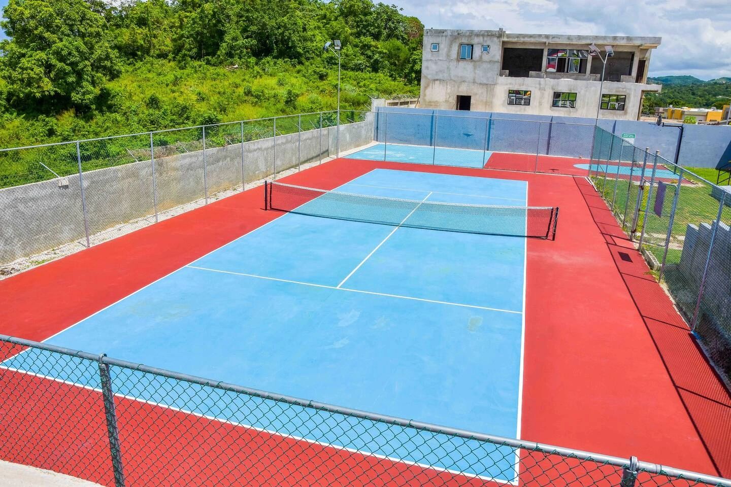 Community tennis and basketball courts