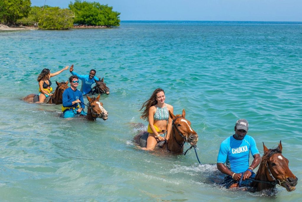 Horseback riding in the ocean