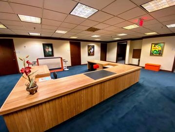 reception area with large wood vintage reception desk