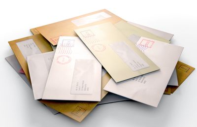 Group of letters with postmarks representing mail service at mindwarehouse