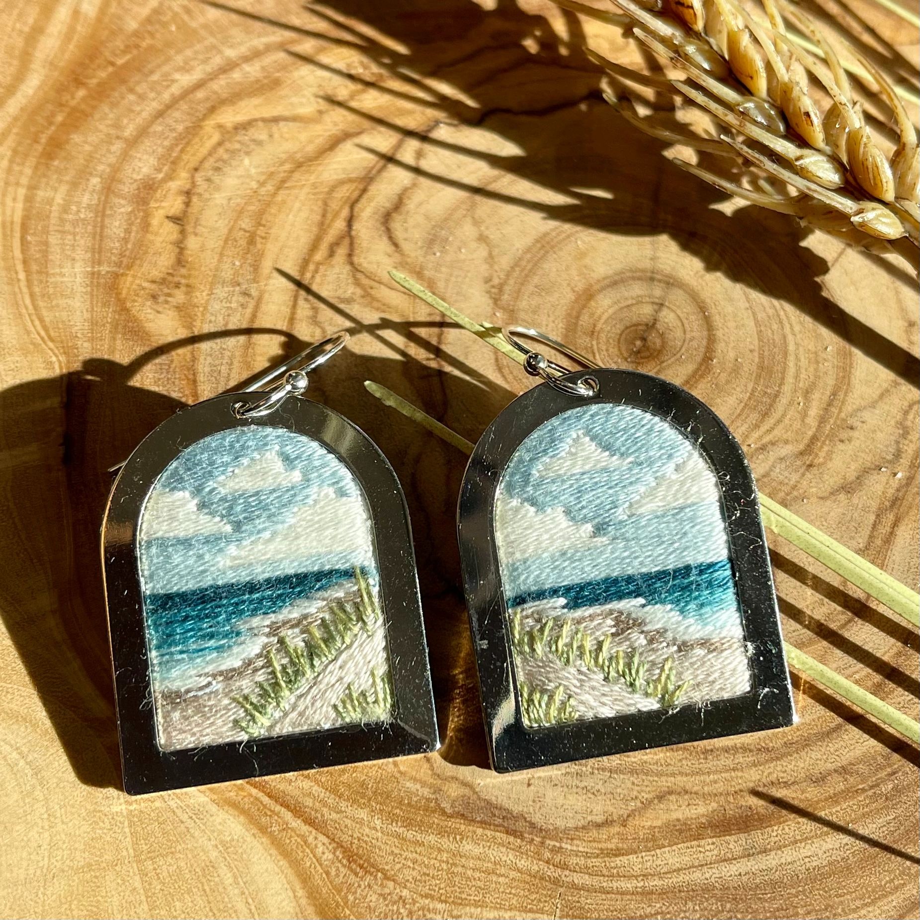 Hand embroidered earrings. Statement earrings featuring a view of the beach.