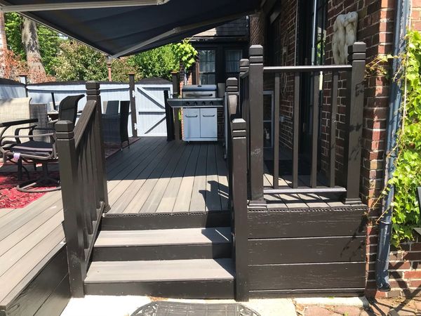 Outdoor living space with stained fence and painted posts, caps & deck structure
Springfield, MA
