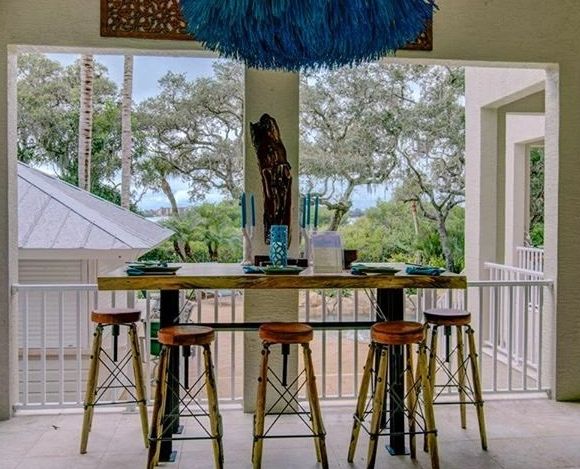 Award winning live edge slab bar at Jewels on the Bay design house fundraiser for Boys & Girls Club