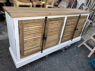 Coastal sideboard cabinet distressed white and natural shutter front doors. Vintage style hardware