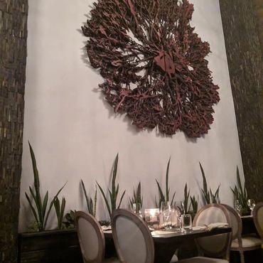 Inside Sage Restaurant with massive 12 ft lychee tree root wall art from Decor Direct