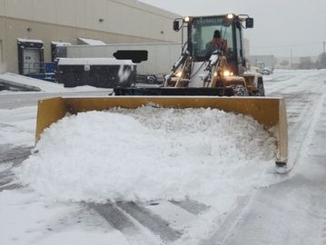 Articulating Tractor with a Snow Pusher Box