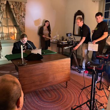 A film production crew filming on location