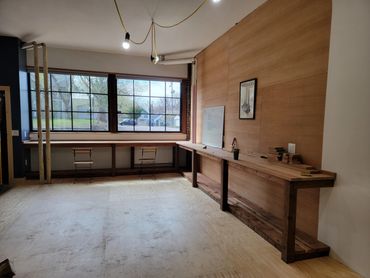 Completed custom workbench made of reclaimed local wood.