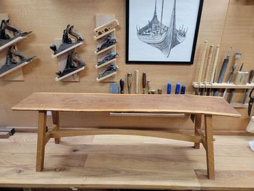 Custom built wooden entry bench. White oak and walnut.