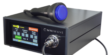 Omniwave device with a touchscreen and handheld probe connected by a cable.