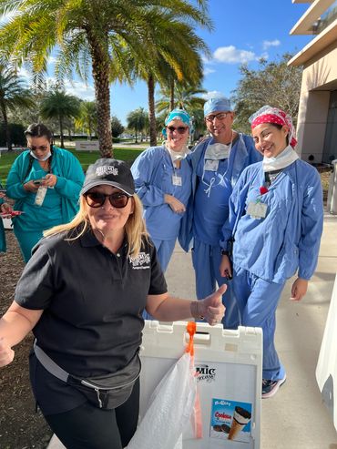 Debbie of Karmic Ice Cream serving Ice Cream to staff at Cleveland Clinic in Weston Florida