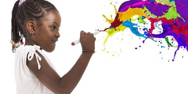 girl painting with many colors