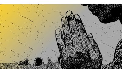 Person praying with hands together, ring visible.