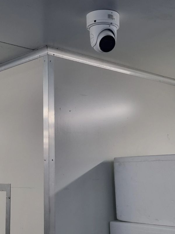 TVT CCTV Camera mounted on roof in business