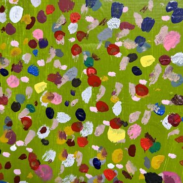 Quantum entanglement a close up image of a work by Angus Fraser, multi coloured dots on lime green