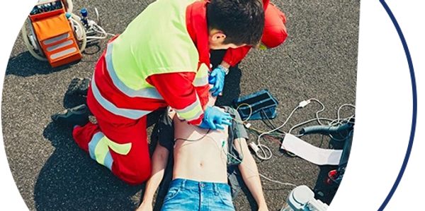 a man giving CPR to a man on the road