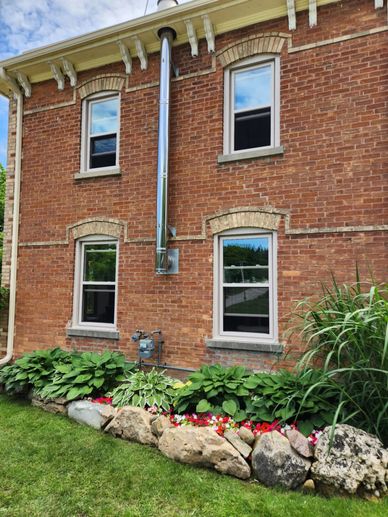 Double-hung windows installed in Angus — classic style with tilt-in sashes for easy cleaning