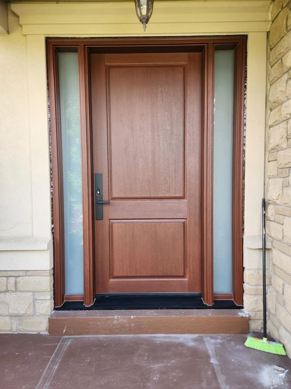 Fiberglass door installation in Barrie Ontario energy-efficient front entry by Bros Windows & Doors.