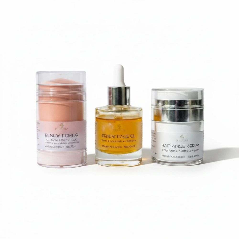Three skincare products: clay mask stick, face oil, and radiance serum.