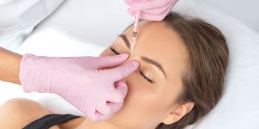 Receiving Botox.