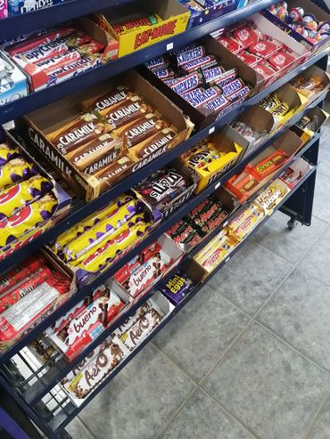 Regular chocolate bars $2.39 plus tax each or 2 for $4.99 after tax. Large/2 bar chocolate $3.99 plu