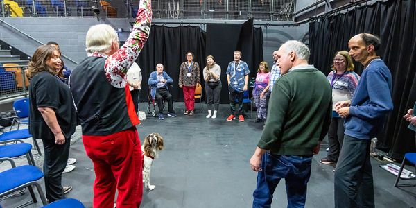 People in group dramatherapy circle