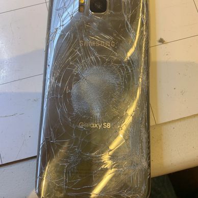 smashed back cover on a Samsung phone