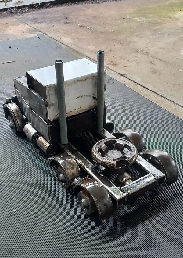 Custom made metal Doorstop out of Scrape Steel