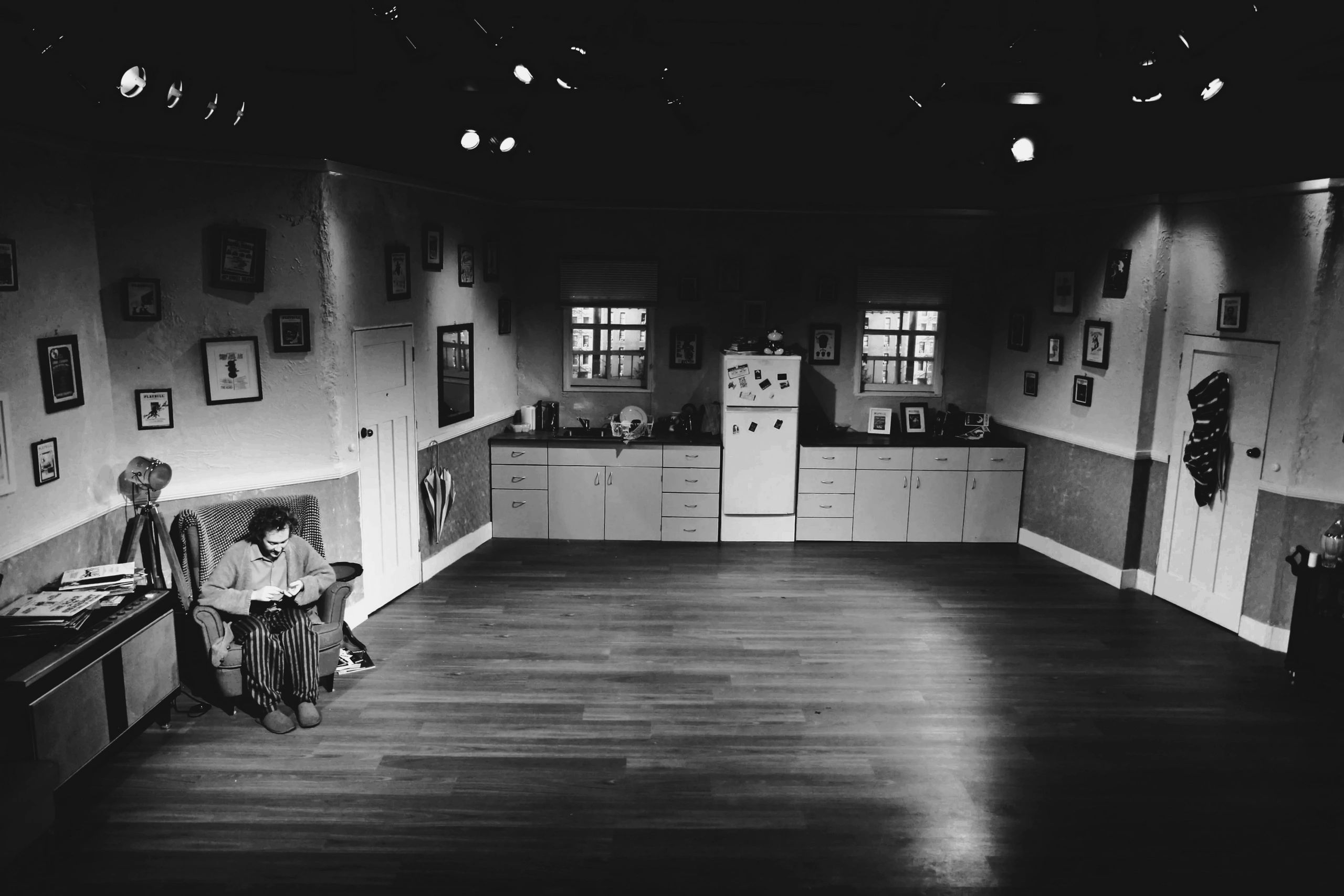 Production shot from The Drowsy Chaperone (2014). Jay James-Moody as Man in Chair Francis Photograhy