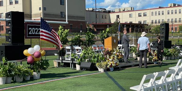 Ground stacked PA system for an outdoor school gradation