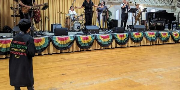 Sound system and stage monitors for a Juneteenth celebration at a school