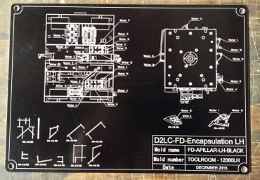 metal tag engraved with tool information