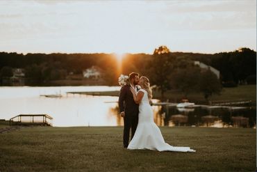 bride and groom at sunset