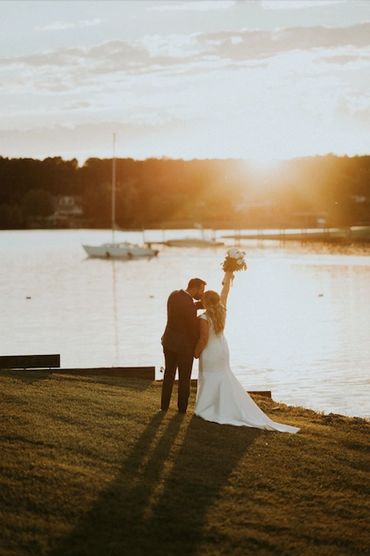 bride and groom at sunset