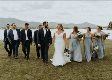 a group of bridesmaids and groomsmen