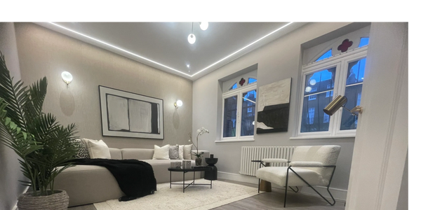 Modern living room with neutral tones and minimalist decor.