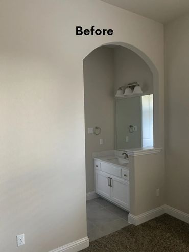 Bathroom sink area visible through an arched opening with "Before" text.