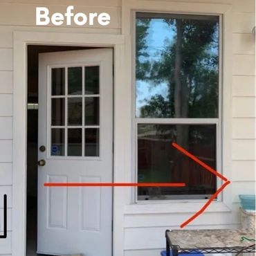 Open door and adjacent window with red arrow pointing to the window.