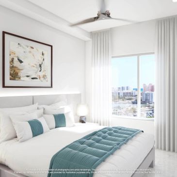Bright modern bedroom with teal accents and city view.