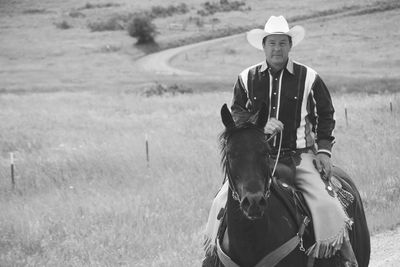 Owner, Mark Thomas riding his horse, Poco.