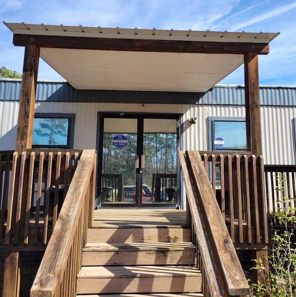 Picture of the front of a business that was tinted with a reflective film